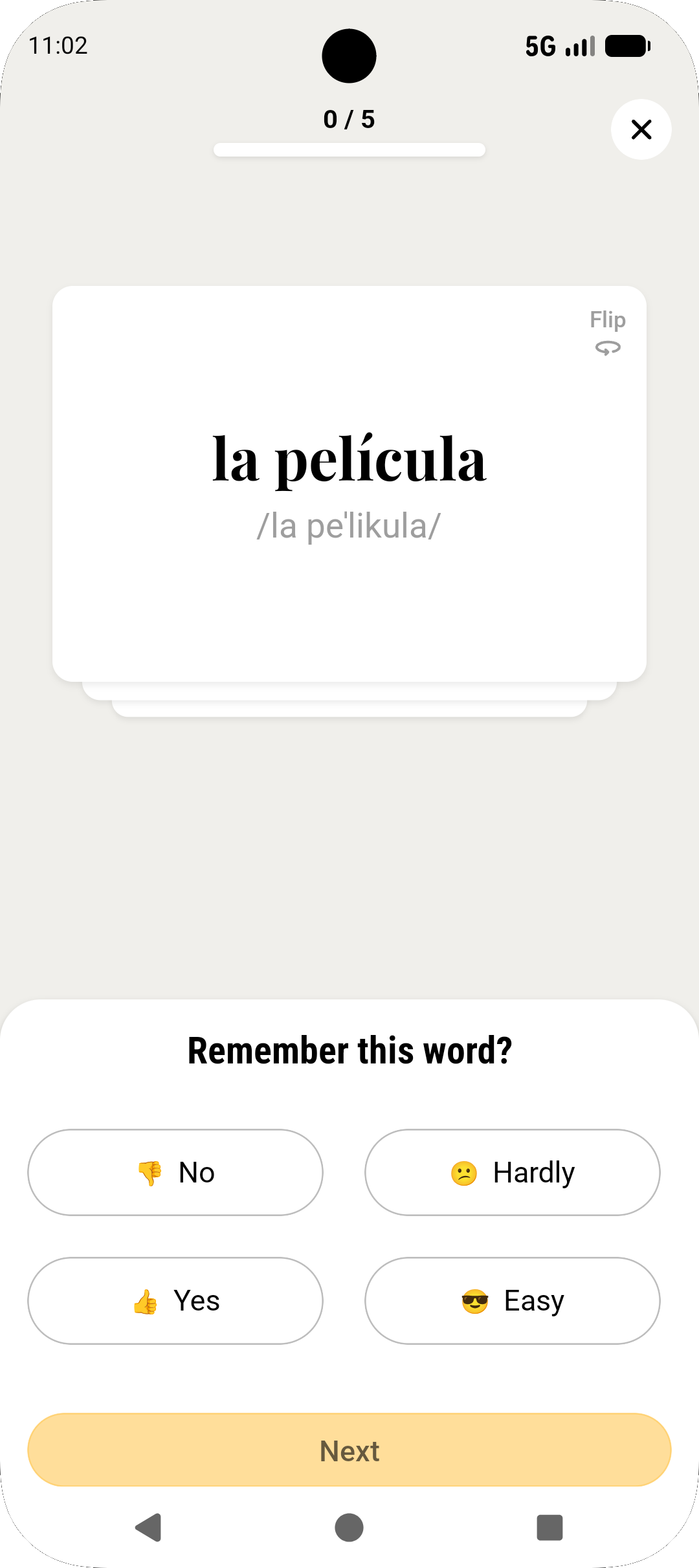 Review screen showing a flashcard with the word 'la película' and feedback options.